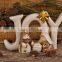 Nativity set religious art word "JOY"