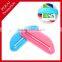 Plastic toothpaste squeezer