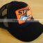 Curved brim Black Trucker Style Hat / Cap with Orange Patch