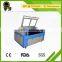 wood cnc laser cutting machine/wedding card design QL-1410 for sale in dubai