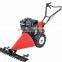 Two wheel tractor with sickle bar mower