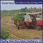 Modification of wheat harvester with triangular track wheels to prevent slipping on muddy ground