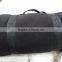 black polar fleece travel blanket with antipilling nylon handle