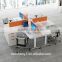 orange and white color staff working desk office workstation design with hang-in cabinet