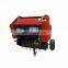 Tractor mounted mini round hay baler