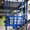 warehouse used high efficient guid rail platform vertical goods lift