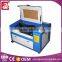 hot sale 3050 350 co2 laser engraving cutting machine co2 laser cutter for cut wedding invitation card