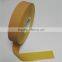 Yellow cork cigarette tipping paper with perforated hole