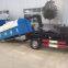 Hook arm garbage truck