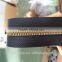 china factory ecor-friendly standard 8 plastic water resistant long chian zipper in golden plastic teeth