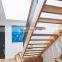 Custom perforated steel screen balustrade staircase with black steel feature