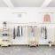 Fashion multi tier retail cloth display rack for clothes shop fittings and display