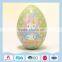 Egg shape tin box for Christmas gift packaging with attractive patterns