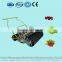 Manual hand push corn seeder