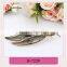 New design fashion low price hair clips for women,feather ponytail holder,tiara accessory