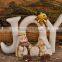 Nativity set religious art word "JOY"