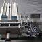 China Guangzhou GMP Standard Double Head Face Mask Making Machine