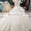 LS10386 white off the shoulder peplum wedding dress with long chapel train dubai wedding dress