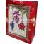 paper gift shoping bag with christmas garland