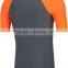 92% Polyester 8% Spandex (Lycra) Short Sleeves Grey Compression Shirt / Rash Guard with Neon Orange Sleeves