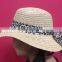 woven straw hat with camouflage band