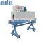 BS-1540 Hualian Cap Seal Plastic Film Wrap PVC Label Packing Tube Heat Sleeve Bottle Labels Shrink Wrapping Machine
