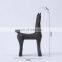 small simple abstract art minimalist room table animal sculpture