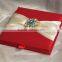 Hot sale elegant red silk hardcover wedding invitations with yellow ribbons&colorful crystal brooches                        
                                                Quality Choice
