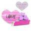 Heart shaped sticky note and eraser with pencil