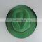 Green cowboy hat setting cap with green ribbon