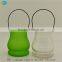 Hanging candle containers with scented candles