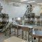 Fully automatic masala powder packing machine with screw elevator