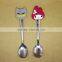 china supplier cheap steel spoon with rubber cap