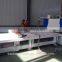 Hydraulic shearing machine with front feeder