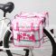 pink and white double rear pannier bag