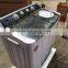 Large quantities of low-cost double tub washing machines