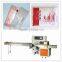 Refreshing towel flow wrapping machine