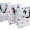 Wholesale custom packaging paper bags paper gift bags with handles
