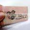 pink colorsynthetic jeans leather label for lady jeans