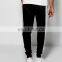 Wholesale 100% cotton elastic waist mens sports blank jogger tapered emboss