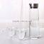 Glass decanter with stainless steel lid with glass set