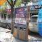 Street side trash bin advertising billboard