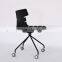 Black plastic stackable wheel chair for studio