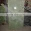 A GRADE GREEN ONYX TABLE TOPS COLLECTION