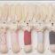 Japanese wholesale products high quality cute rattle toy and bib 1 month baby gift set for birthday and Christmas made in Japan