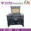 Guangzhou Hanniu 900*600mm UD-9060 Co2 Laser Leather Cutting Machine With Up And Down Table