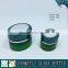 Green colored glass pump lotion bottle and cosmetic glass cream jar