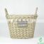 Oval wicker basket with handle and plastic lined