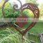 Outdoor rusty heart shaped metal sheet cutting crafts for kids