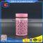 round shape clear glass canister in pink coat